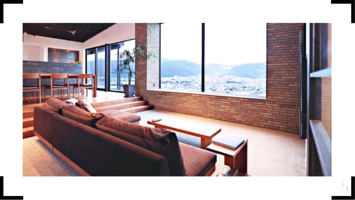 This twobuilding residence in Japan uses shadows and light to create a